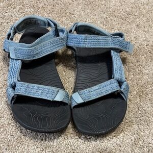 Teva Hurricane XLT2 sandals in a light blue color. Size 2